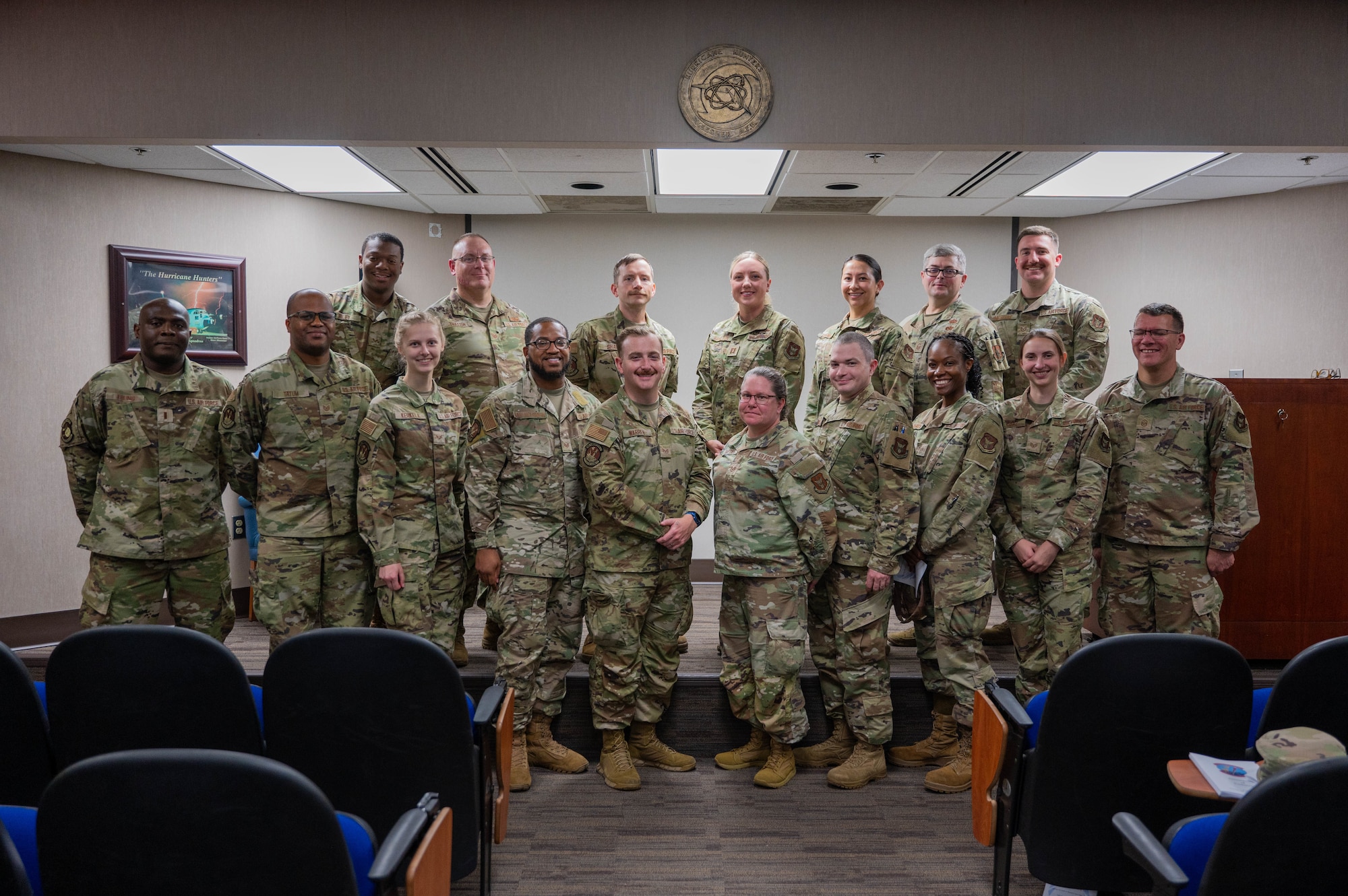 The 403rd Communications Flight stands together for a group picture to welcome the new commander, Captain Augusta Hamilton.