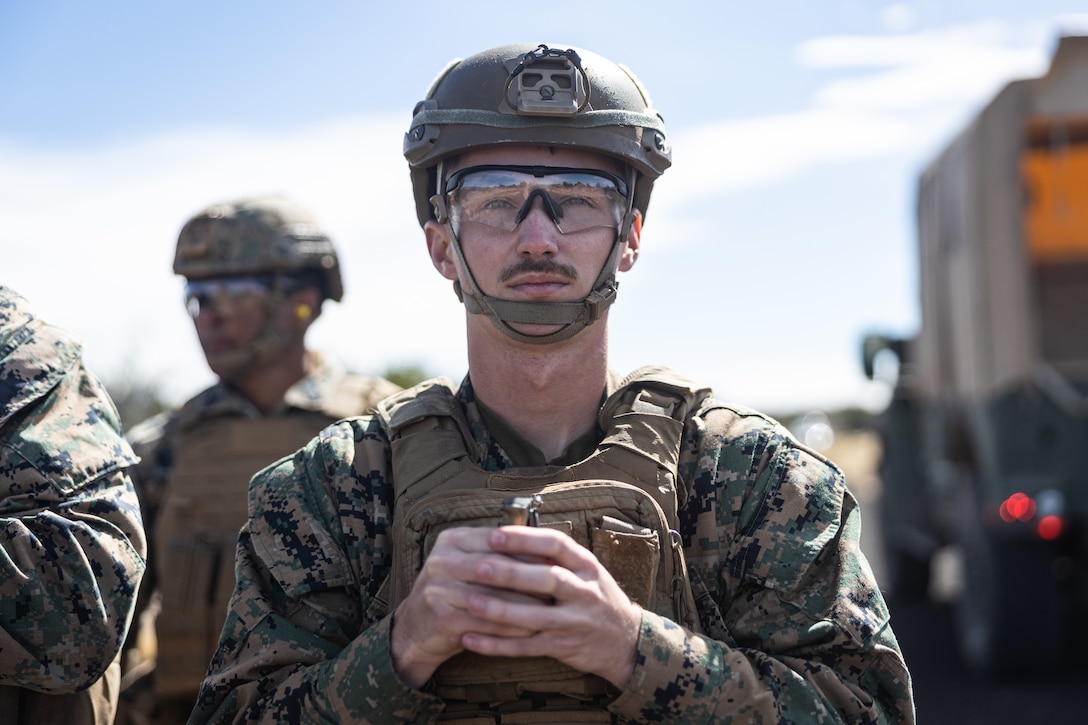 U.S. Marine Corps Cpl. Hunter Trinosky, a native of Indiana and a logistics specialist with 3d Littoral Anti-Air Battalion, 3d Marine Littoral Regiment, 3d Marine Division, holds an M67 grenade during a training exercise at Pohakuloa Training Area, Hawaii, Jan. 29, 2025. The training exercise taking place at PTA mirrors a Service Level Training Exercise by setting conditions for 3d MLR and its subordinate battalions to go forward to the Philippines in support of Exercise Balikatan 25 and Kamandag 9 this summer. (U.S. Marine Corps photo by Cpl. Malia Sparks)