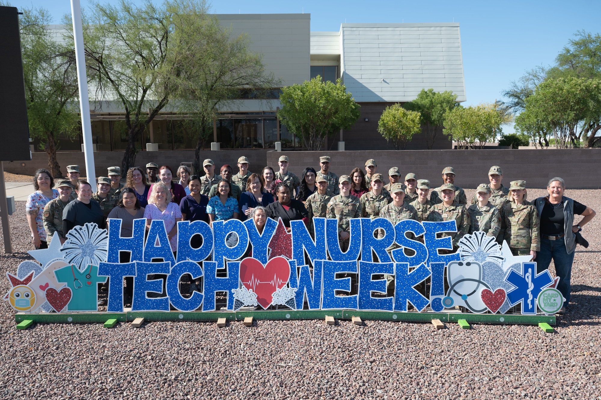 Nurses and technicians assigned to the 355th Medical Group pose for a group photo at Davis-Monthan Air Force Base, Arizona, May 7, 2025. Nurse and Technicians Week highlights medical professionals across the nation. (U.S. Air Force photo by Airman Jaden Kidd)