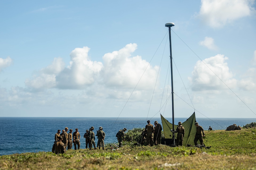 U.S. Marines with 3d Littoral Combat Team, 3d Marine Littoral Regiment, 3d Marine Division, and Philippine Marines with Marine Battalion Landing Team 10, conduct bilateral training with a new commercial radar system while participating in the Maritime Key Terrain Security Operations event during Exercise Balikatan 25 on an island in the Batanes, April 26, 2025. The MKTSO event experiments with the Littoral Reconnaissance Team concept by deploying low-signature, light-weight formations to the Batanes island chain to rehearse Expeditionary Advanced Base Operations, test sensing capabilities, and simulate securing and defending key maritime terrain. Balikatan is a longstanding annual exercise between the Armed Forces of the Philippines and U.S. military designed to strengthen our ironclad alliance, improve our capable combined force, and demonstrate our commitment to regional security and stability. (U.S. Marine Corps photo by Cpl. Malia Sparks)