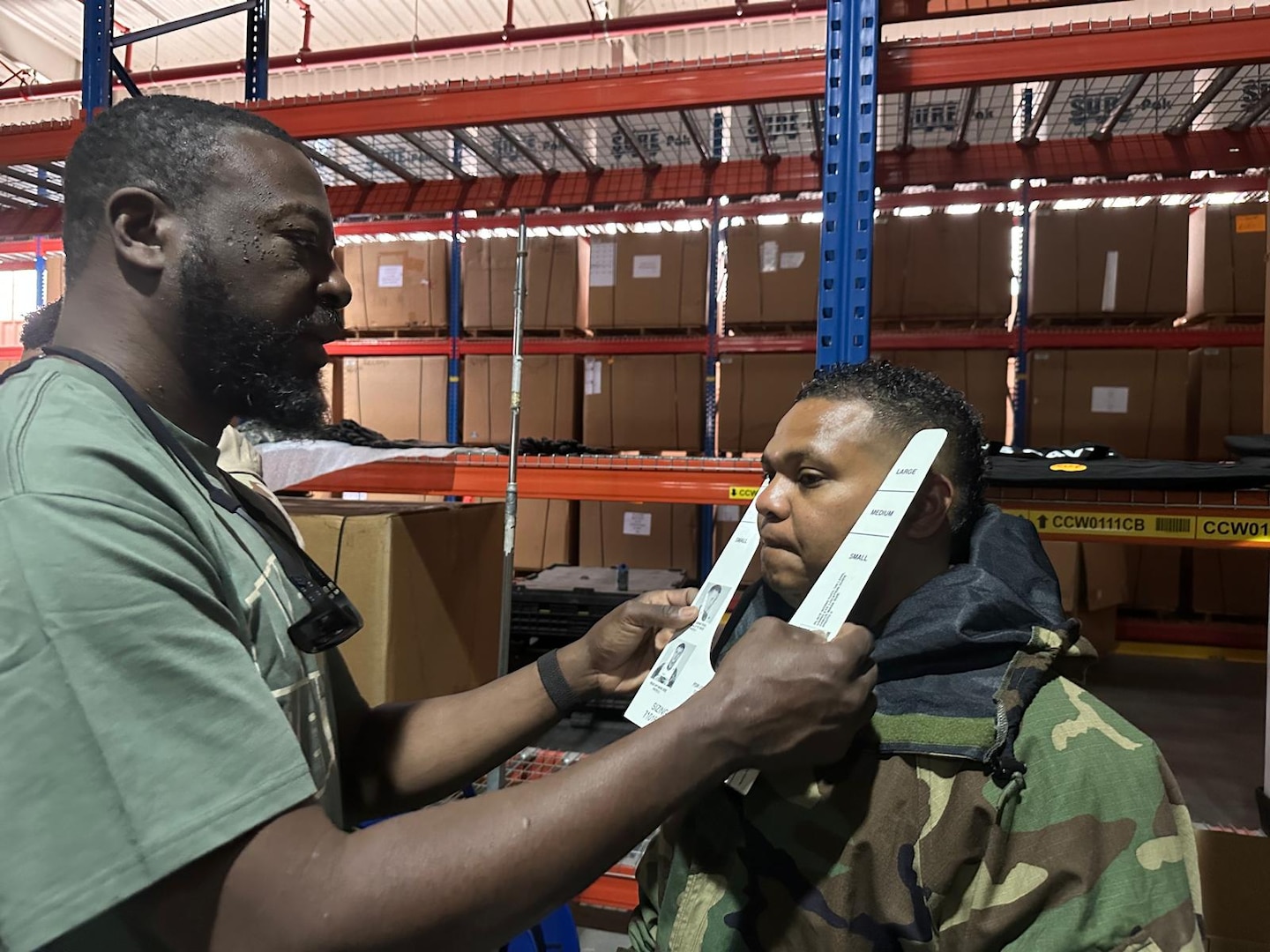 People does fitting for protective equipment.