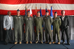 U.S. Air Force distinguished visitors and leaders pose for a group photo upon completing the Initial Operational Capability ceremony at Ebbing Air National Guard Base, Arkansas, May 9, 2025.
