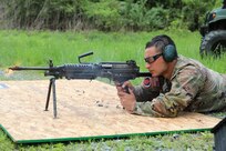 Spc. Robert Ruiz-Rhoades of the Pennsylvania National Guard's 28th Expeditionary Combat Aviation Brigade fires an M249 light machine gun during the Region II Best Warrior Competition at Fort Indiantown Gap, Pennsylvania, May 8, 2025. (U.S. Army National Guard photo by Spc. Annie M. Riley)