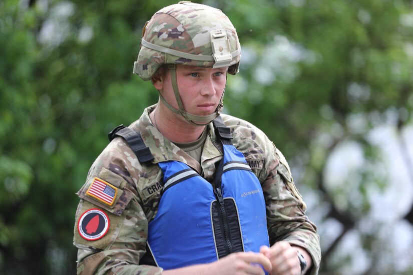 Sgt. Miles Crawford of the Maryland National Guard's 58th Military Intelligence Brigade prepares to compete in the kayaking event during the Region II Best Warrior Competition in Harrisburg, Pennsylvania, May 6, 2025. (U.S. Army National Guard photo by Spc. Annie M. Riley)