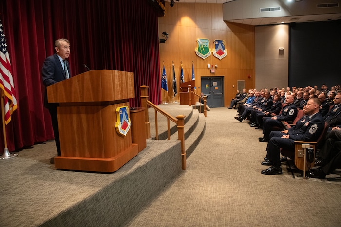 Edwin Oshiba, Performing the Duties of Under Secretary of the Air Force, briefs civic leaders from across the country at the National Security Forum at Maxwell Air Force Base, Alabama, May 6, 2025. This is the 71st anniversary of the SecAF-sponsored NSF hosted by Air University's Air War College, May 6-8, 2025. (U.S. Air Force photo by Trey Ward)
