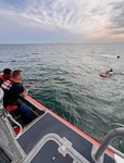 A Coast Guard Station St. Petersburg boat crew rescues a man after his 15-foot vessel capsized near the Sunshine Skyway Bridge. Sharing his float plan with his wife, and coordination between St. Petersburg Fire Rescue and Pinellas County Sheriff’s Office crews helped save the man's life. (U.S. Coast Guard photo)