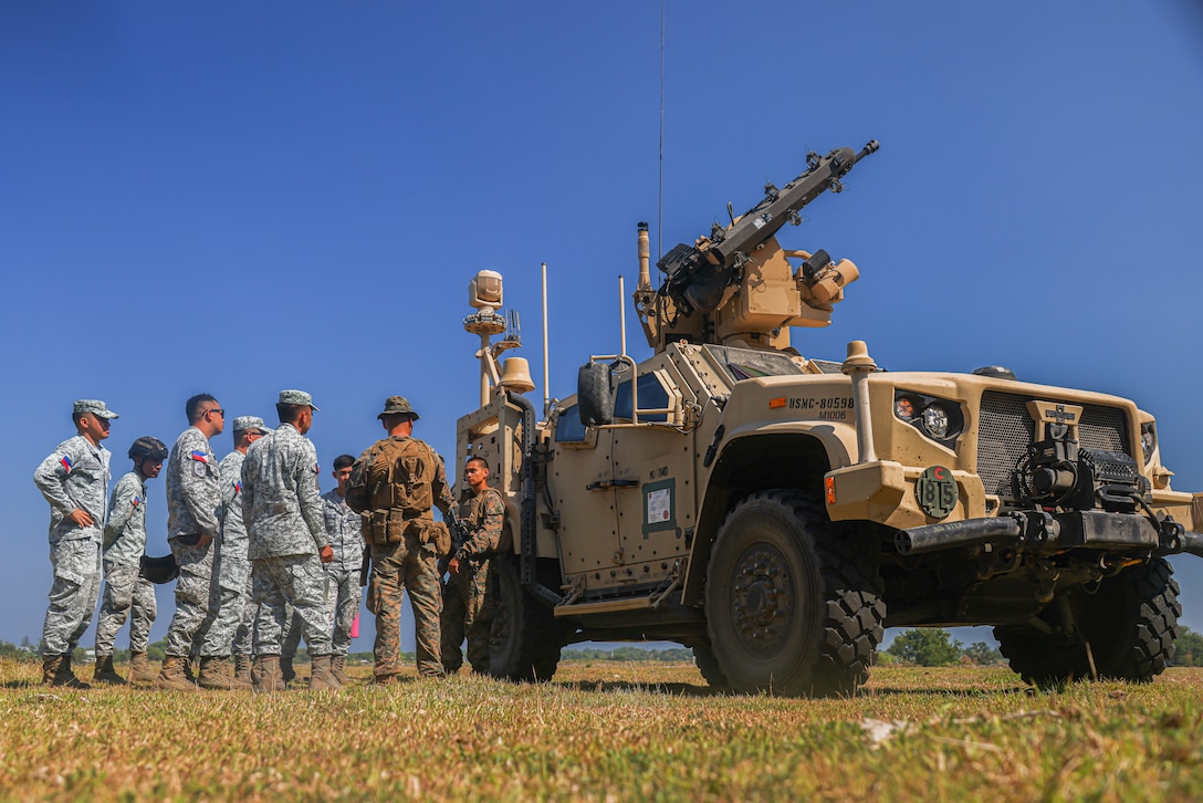 U.S. Marines with 3d Littoral Anti-Air Battalion, 3d Marine Littoral Regiment, 3d Marine Division, teach Philippine Airmen with the 960th Air and Missile Defense Group, how the Marine Air Defense Integrated System operates during the Integrated Air and Missile Defense event as a part of Exercise Balikatan 25, at Naval Station Leovigildo Gantioqui, Philippines, April 24, 2025.