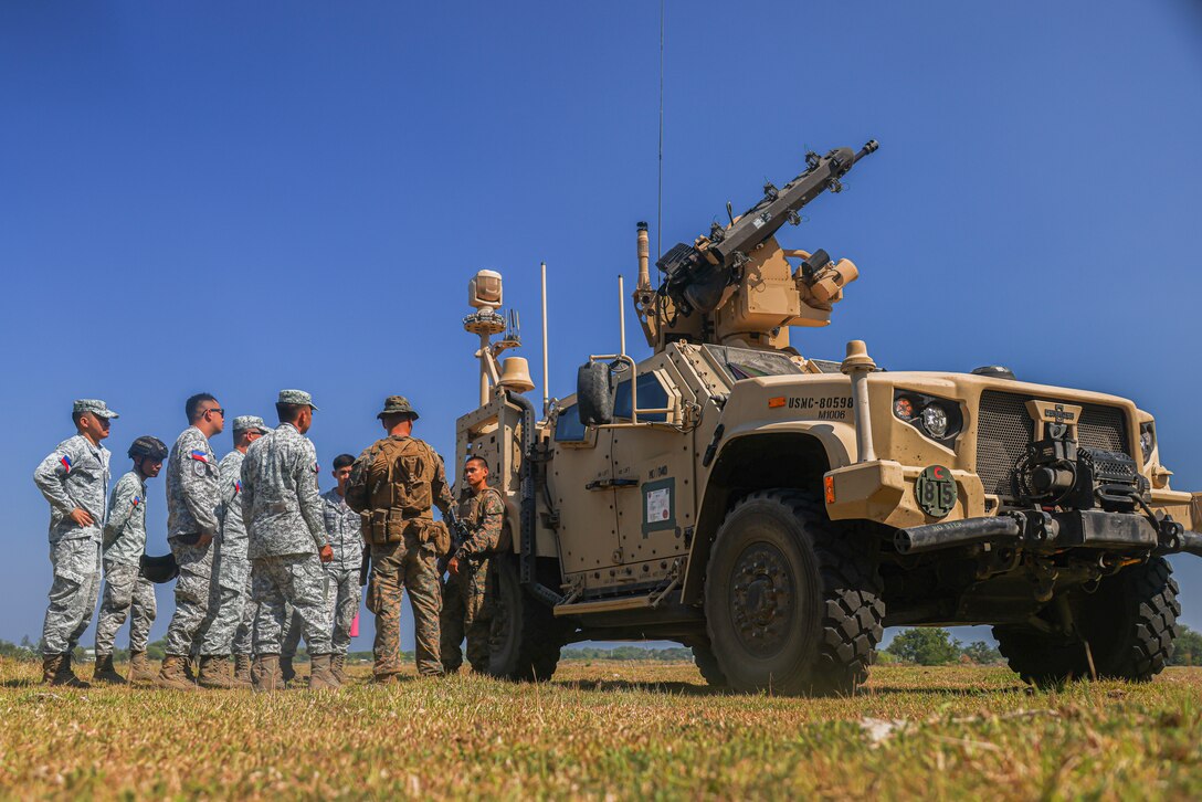 U.S. Marines with 3d Littoral Anti-Air Battalion, 3d Marine Littoral Regiment, 3d Marine Division, teach Philippine Airmen with the 960th Air and Missile Defense Group, how the Marine Air Defense Integrated System operates during the Integrated Air and Missile Defense event as a part of Exercise Balikatan 25, at Naval Station Leovigildo Gantioqui, Philippines, April 24, 2025.