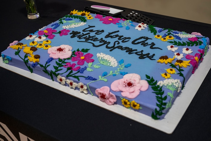 A Spouse Appreciation Day cake sits on a table.