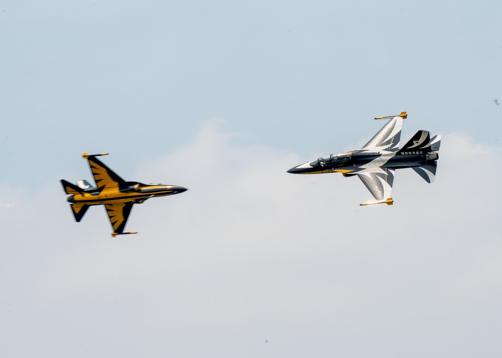 Republic of Korea Air Force Black Eagles perform aerial maneuvers during Osan Air Power Days at Osan Air Base, Republic of Korea, May 11, 2025.  During the aerial demonstration, the Black Eagles performed a variety of complex maneuvers including the Roll Back and Afterburner Loop, a four-ship Double Helix, Typhoon Landing, and more. (U.S. Air Force photo by Senior Airman Sarah Williams)
