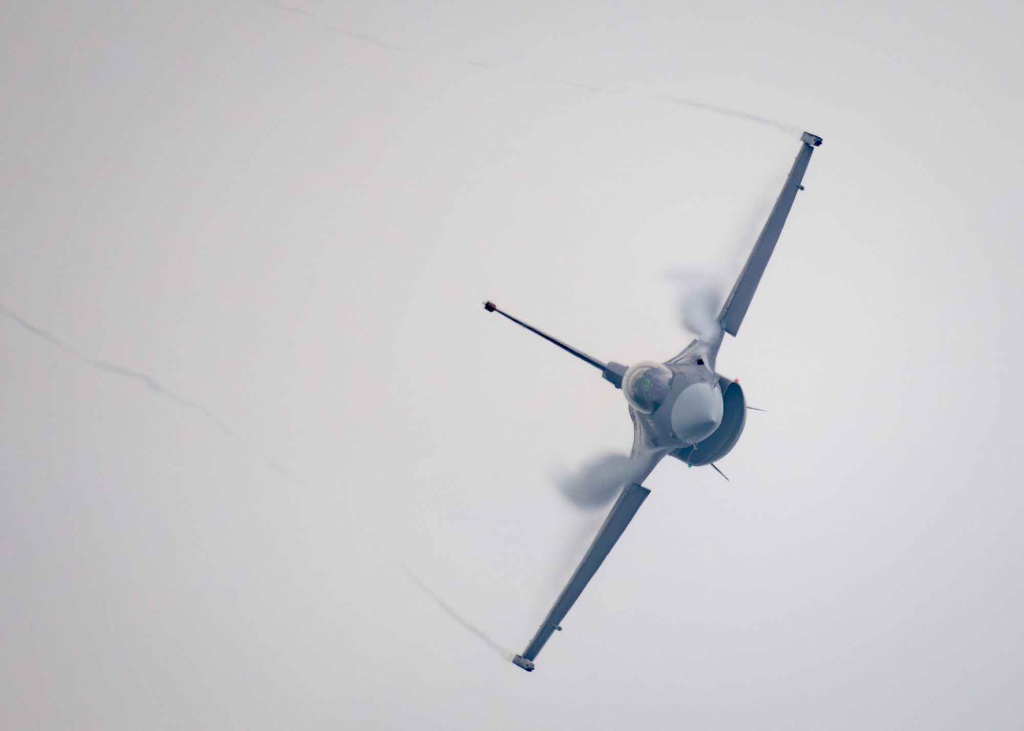 U.S. Air Force Bapt. Ethan “Bantan” Smith, Pacific Air Forces F-16 Demonstration Team pilot, performs a high-intensity aerial maneuver in an F-16 Fighting Falcon assigned to the 51st Fighter Wing during Osan Air Power Days 2025, May 11, 2025, Osan Air Base, Republic of Korea. The PACAF Demonstration Team, based out of Misawa Air Base, Japan, flew combat-coded 51st Fighter Wing F-16s to showcase the agility and combat capabilities of 7th Air Force assets committed to defending the Korean Peninsula. (U.S. Air Force photo by Maj. Kippun Sumner)