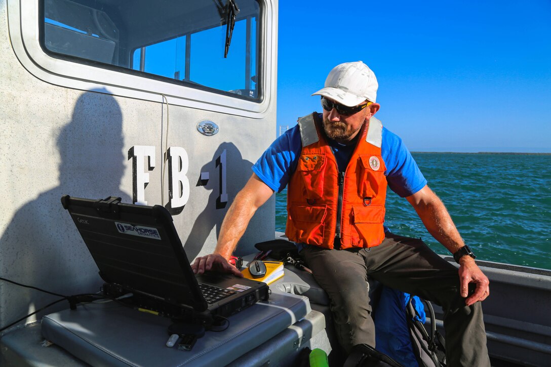U.S. Army Corps of Engineers, (USACE), Dredge MURDEN pumps sand and slurry materials during 24/7 dredge operations in Naval Station Guantanamo Bay, Cuba, April 23, 2025. Dredge MURDEN is clearing critical shoaling by dredging areas that will maintain safe and efficient navigation conditions for military and commercial vessels in the harbor. (USACE Photo by Mark Rankin)