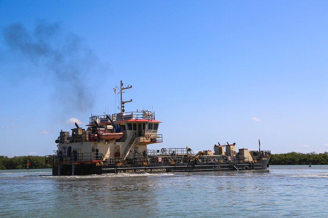 U.S. Army Corps of Engineers, (USACE), Dredge MURDEN pumps sand and slurry materials during 24/7 dredge operations in Naval Station Guantanamo Bay, Cuba, April 23, 2025. Dredge MURDEN is clearing critical shoaling by dredging areas that will maintain safe and efficient navigation conditions for military and commercial vessels in the harbor. (USACE Photo by Mark Rankin)