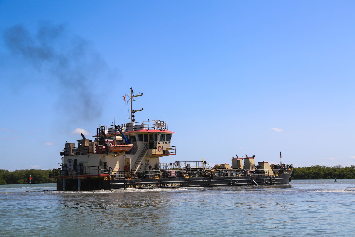 U.S. Army Corps of Engineers, (USACE), Dredge MURDEN pumps sand and slurry materials during 24/7 dredge operations in Naval Station Guantanamo Bay, Cuba, April 23, 2025. Dredge MURDEN is clearing critical shoaling by dredging areas that will maintain safe and efficient navigation conditions for military and commercial vessels in the harbor. (USACE Photo by Mark Rankin)