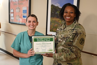 Courtney Tindall-Diehl DAISY Award with Col. Bowser.