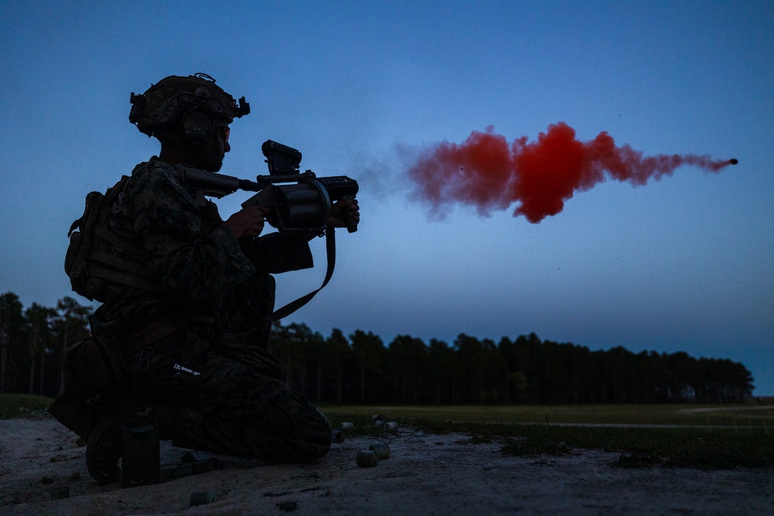 U.S. Marine Corps Lance Cpl. Aidan Smith, a rifleman with Golf Company, 2nd Battalion, 2nd Marine Regiment, fires an M32 grenade launcher during a live-fire shoot range as part of Exercise Chesapeake 25 at Marine Corps Base Camp Lejeune, North Carolina, May 1, 2025. Exercise Chesapeake 2025 was a bilateral U.S.–French naval exercise that underscored a commitment to interoperability, maritime readiness, and shared values. (U.S. Marine Corps Photo by Lance Cpl. Jack Labrador)