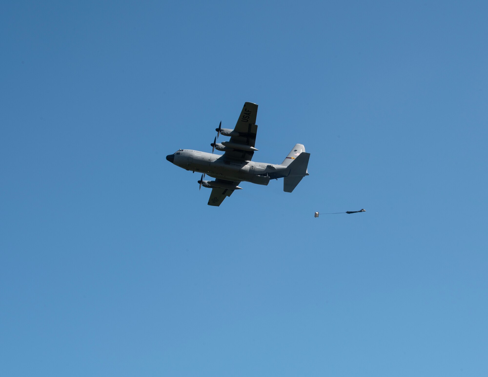 U.S. Air Force C-130 Hercules from the 133rd Airlift Wing, Minnesota Air National Guard, performs a low-cost, low-altitude (LCLA) airdrop in Ceiba, Puerto Rico, April 8, 2025.