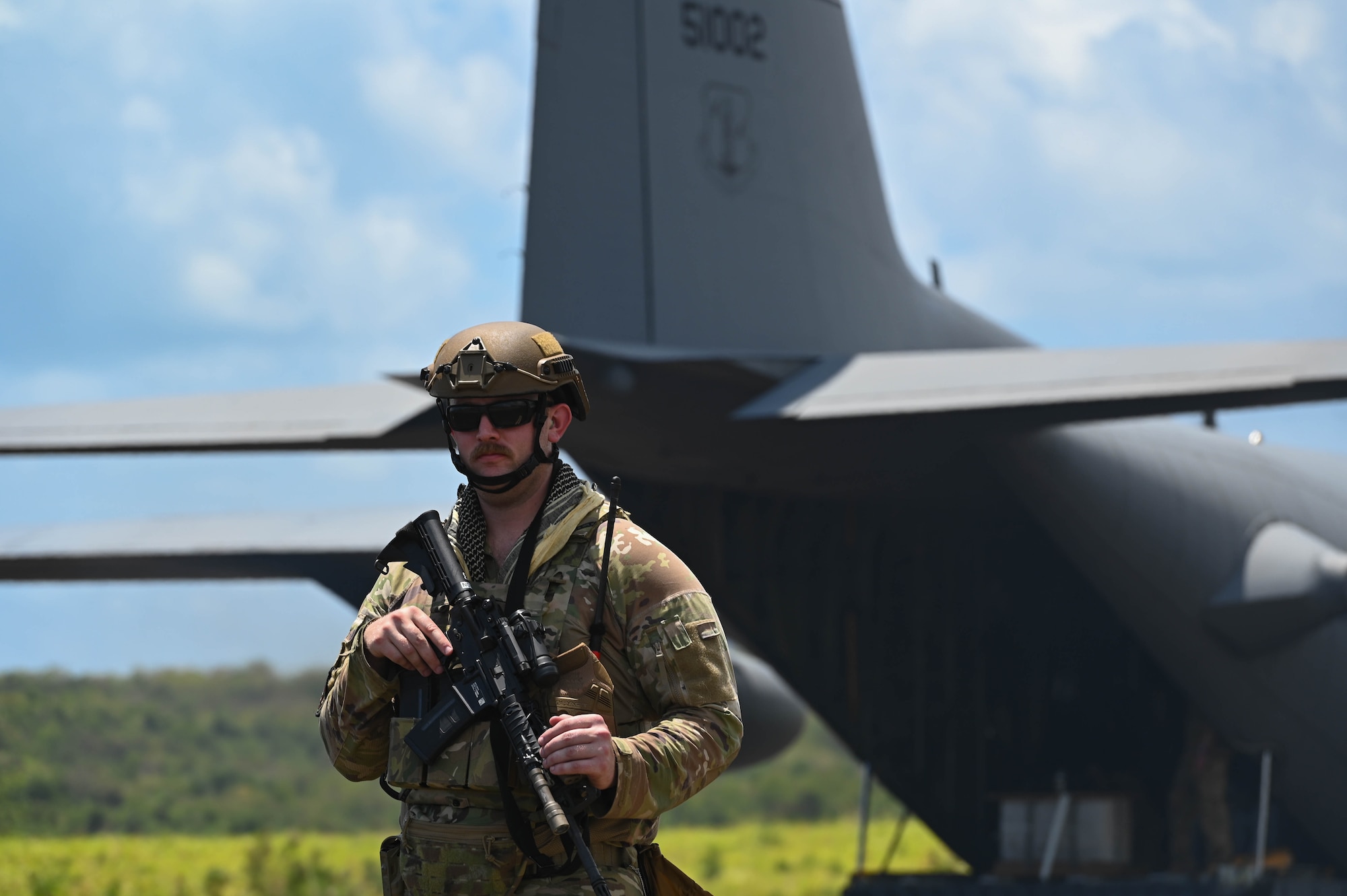 U.S. Air Force Airman from the 133rd Contingency Response Flight, Minnesota Air National Guard, scans the perimeter in Ceiba, Puerto Rico, April 9, 2025.