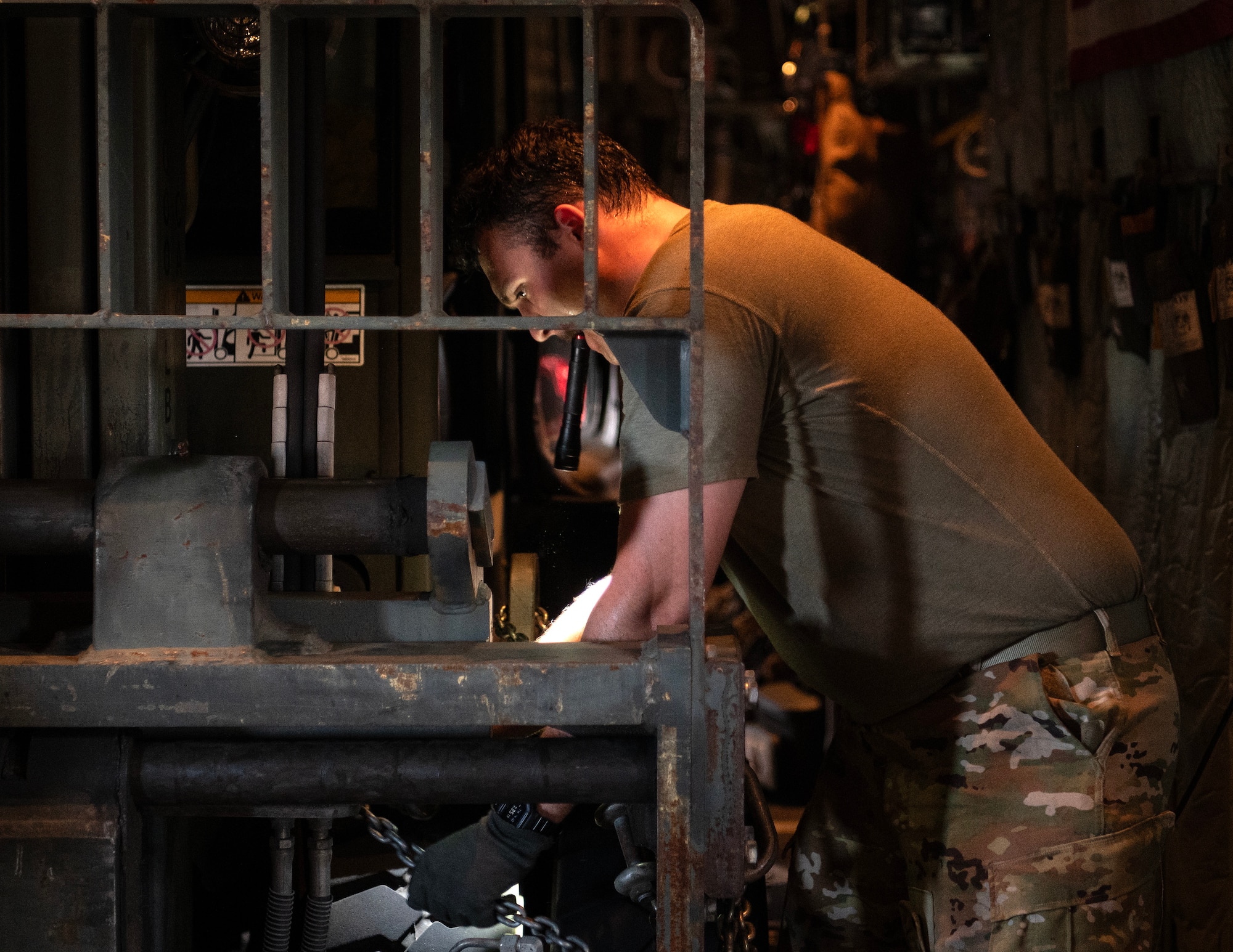 U.S. Air Force Airman 1st Class Elias Andrzejek, 109th Airlift Squadron, secures a forklift on a C-130 Hercules in Ceiba, Puerto Rico, April 10, 2025.