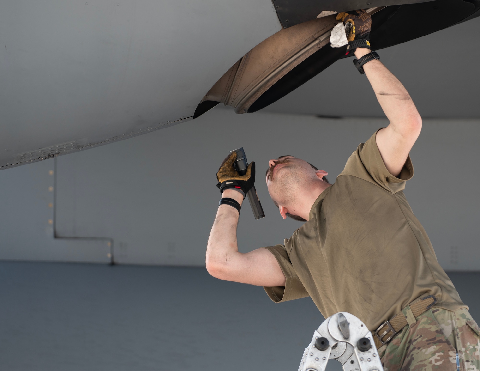 U.S. Air Force Airman from the 133rd Maintenance Group performs pre-flight checks on a C-130 Hercules in St. Croix, U.S. Virgin Islands, April 8, 2025.