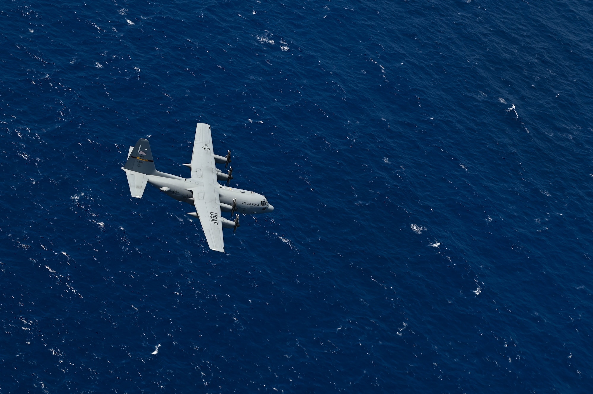 U.S. Air Force C-130 Hercules from the 133rd Airlift Wing, Minnesota Air National Guard, flies over the seas of the U.S. Virgin Islands, April 9, 2025.