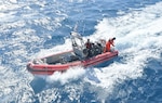 Coast Guard Cutter Alert (WMEC 630) crew members conduct small boat testing, Dec. 2, 2024, while underway in the Florida Straits. Alert's crew conducted a 60-day maritime safety and security patrol in the Florida Straits; the deployment marked its first since the cutter shifted home ports from Astoria, Oregon, to Cape Canaveral, Florida.