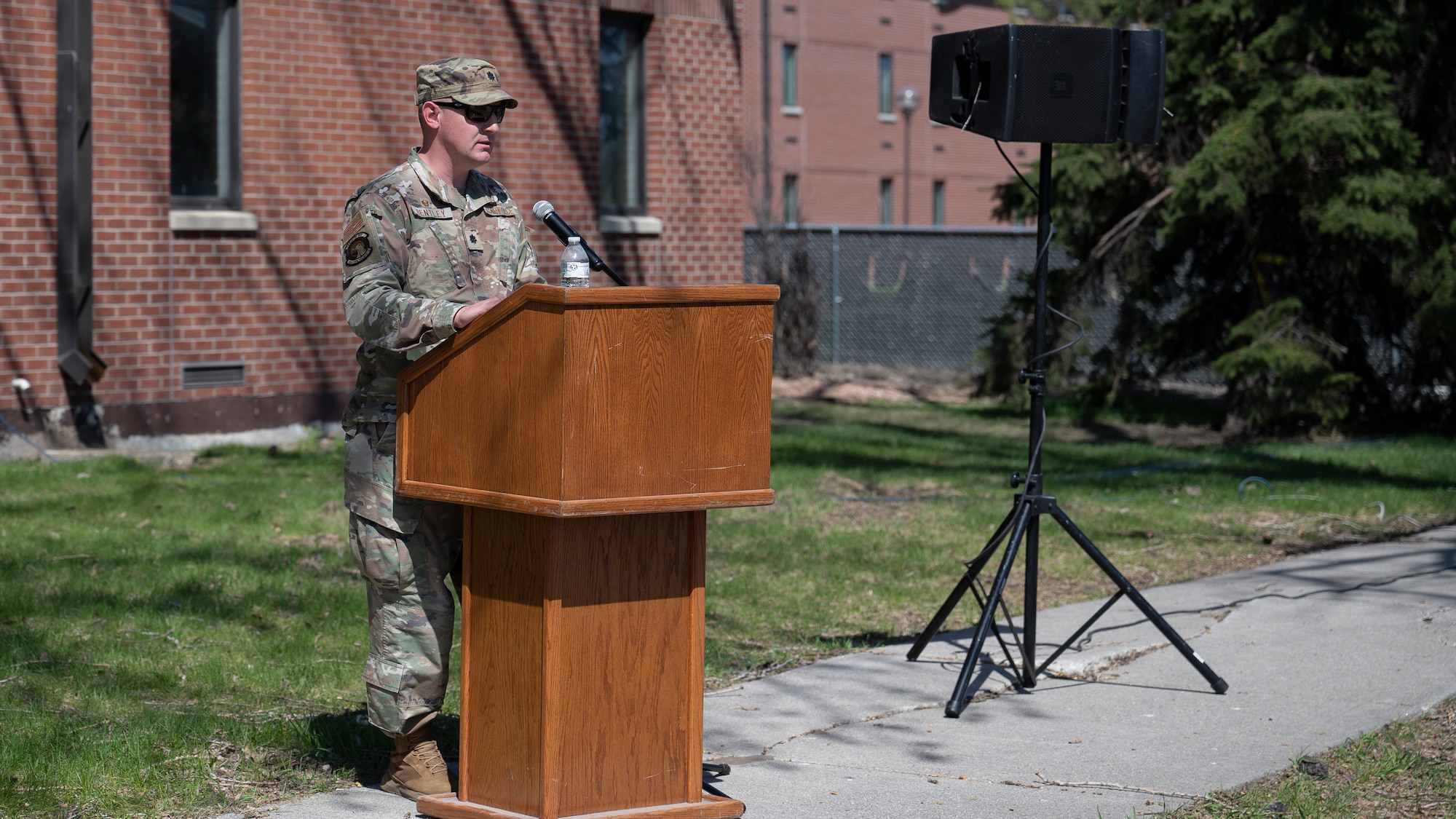 Lt. Col William Bentley, 319th Civil Engineer Squadron commander, delivers a speech for the Bunch Hall dormitory groundbreaking ceremony at Grand Forks Air Force Base, N.D., May 7, 2025. The ceremony celebrated the start of a renovation project that is estimated to take a year to complete. (U.S. Air Force photo by Airman Nailah Pacheco)