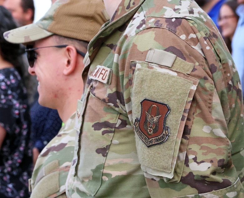 Air Force Reservists stands at ease.