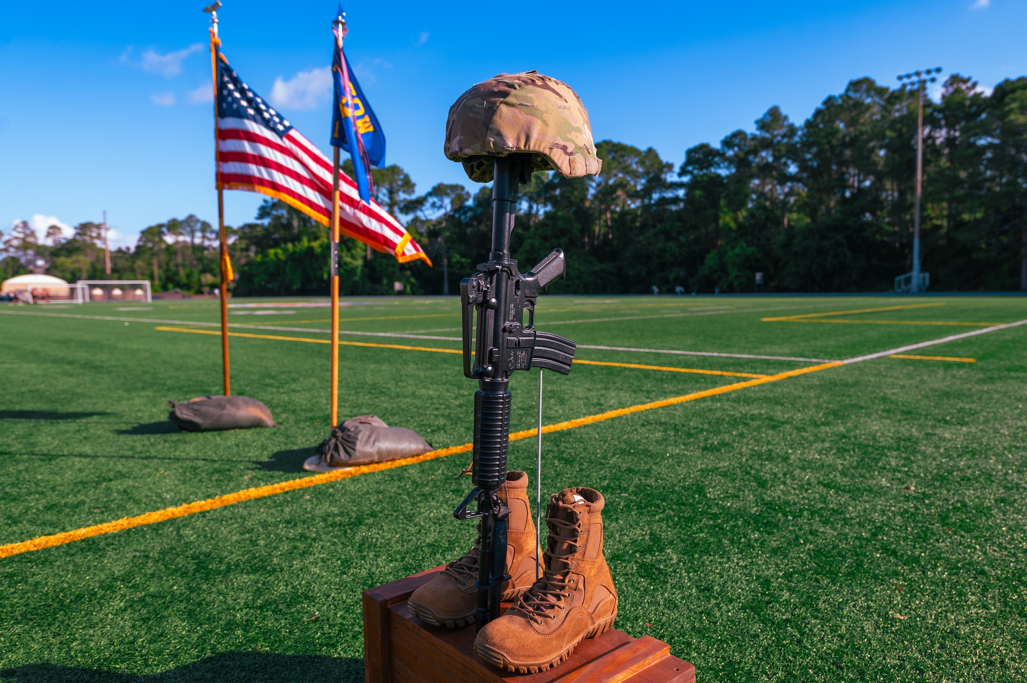 A battlefield cross is displayed during the Police Week opening ceremony at Hurlburt Field.