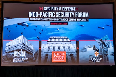 U.S. Army Lt. Gen. Joshua M. Rudd, deputy commander of U.S. Indo-Pacific Command, speaks with retired Australian Defence Force Brigadier Ian Langford, executive director of Security and Defence PLuS, during the Indo-Pacific Security Forum in Honolulu, May 12, 2025.
