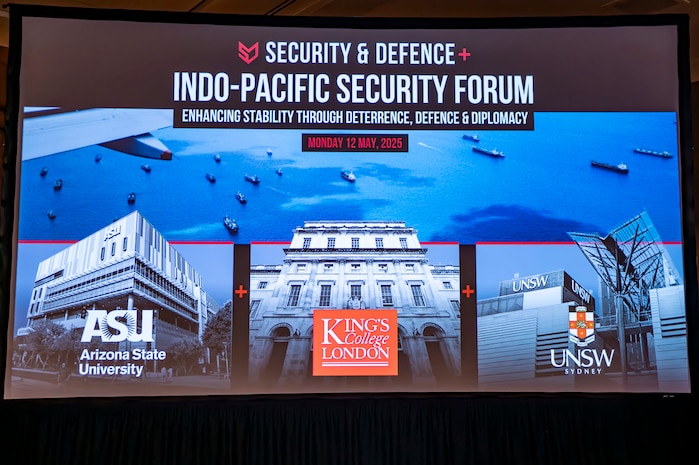 U.S. Army Lt. Gen. Joshua M. Rudd, deputy commander of U.S. Indo-Pacific Command, speaks with retired Australian Defence Force Brigadier Ian Langford, executive director of Security and Defence PLuS, during the Indo-Pacific Security Forum in Honolulu, May 12, 2025.