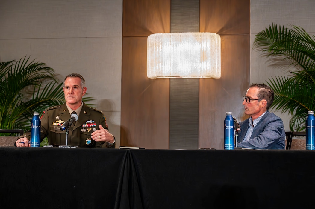 .S. Army Lt. Gen. Joshua M. Rudd, deputy commander of U.S. Indo-Pacific Command, speaks with retired Australian Defence Force Brigadier Ian Langford, executive director of Security and Defence PLuS, during the Indo-Pacific Security Forum in Honolulu, May 12, 2025.