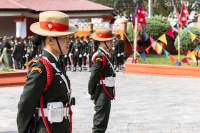 Military police officers with the Nepali Army stand in front of the Eternal Flame Memorial during the 10th Anniversary Operation Sahayogi Haat Wreath Laying Ceremony at the Nepal Military Museum, Kathmandu, Nepal, May 12, 2025.