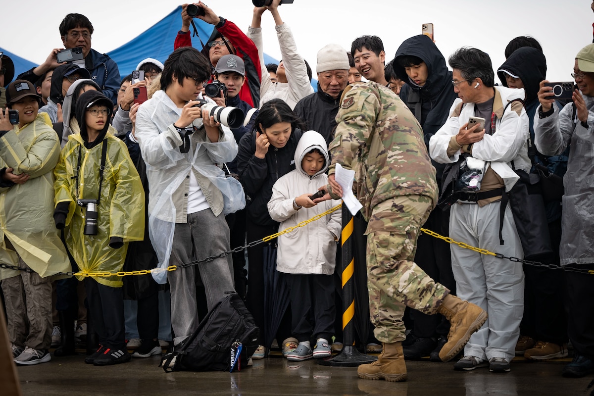 A young attendee holds a spent GAU-8/A Avenger cannon shell gifted by 25th Fighter Generation Squadron maintainers during Osan Air Power Days 2025 at Osan Air Base, Republic of Korea, May 10, 2025. The giveaway offered a hands-on connection to the A-10 Thunderbolt II’s legacy and left a lasting impression on the next generation of aviation enthusiasts. (U.S. Air Force photo by Senior Airman Tallon Bratton)