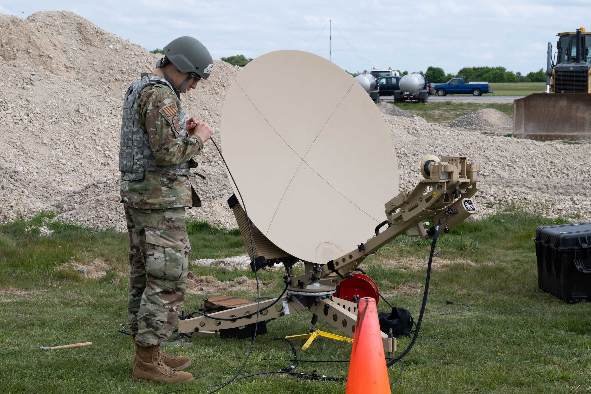 A U.S. Airman assigned to the 100th Communications Squadron assembles a satellite terminal during combat readiness inspection Skyway Chariot at RAF Feltwell, England, May 8, 2025.