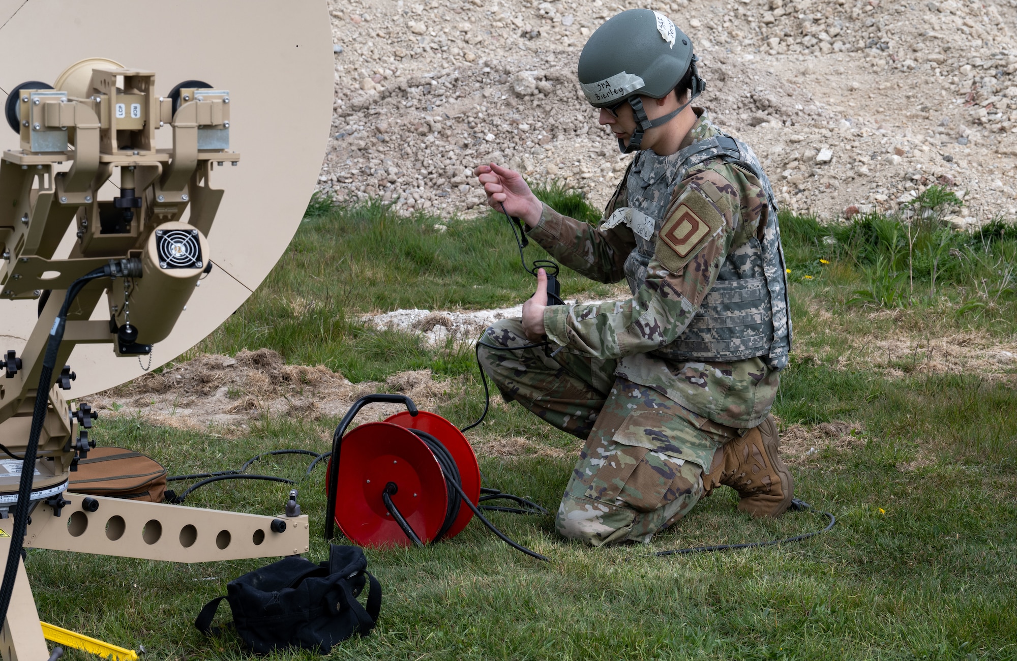 A U.S. Airman assigned to the 100th Communications Squadron assembles a satellite terminal during a combat readiness inspection Skyway Chariot at RAF Feltwell, England, May 8, 2025.
