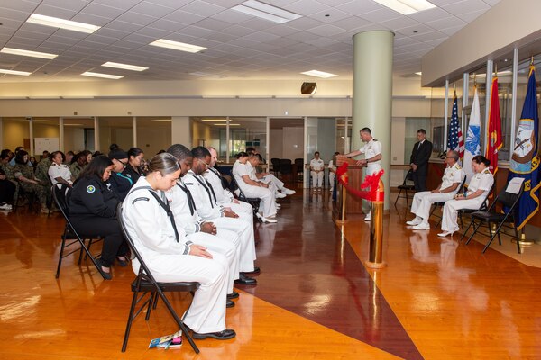 Lt. Cmdr. Aaron Walling, one of Naval Medical Center San Diego's Chaplain, gives a blessing of the ward during a ribbon-cutting ceremony to celebrate the completion of NMCSD's 1 West Mental Health Ward expansion. The mission of NMCSD is to provide a superior experience for our patients, staff, and warfighters. NMCSD employs more than 5,000 active-duty military personnel, civilians, and contractors in southern California to deliver exceptional care afloat and ashore. (U.S. Navy photo by Mass Communication Specialist 2nd Class Celia Martin)
