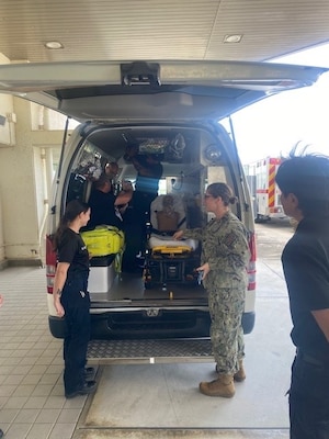 Capt. Michelle Sangiorgi instructs participants in various bed configurations and transport best practices.