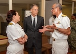 Rear Adm. Guido Valdes, Commander, Naval Medical Forces Pacific, and Director, Defense Health Network Pacific Rim, right, speaks to Capt. Elizabeth Adriano, Naval Medical Center San Diego's Director, left, and Mr. John Henley, NMCSD's Inpatient Mental Health Department Head, following a ribbon-cutting ceremony to celebrate the completion of NMCSD's 1 West Mental Health Ward expansion. The mission of NMCSD is to provide a superior experience for our patients, staff, and warfighters. NMCSD employs more than 5,000 active-duty military personnel, civilians, and contractors in southern California to deliver exceptional care afloat and ashore. (U.S. Navy photo by Mass Communication Specialist 2nd Class Celia Martin)