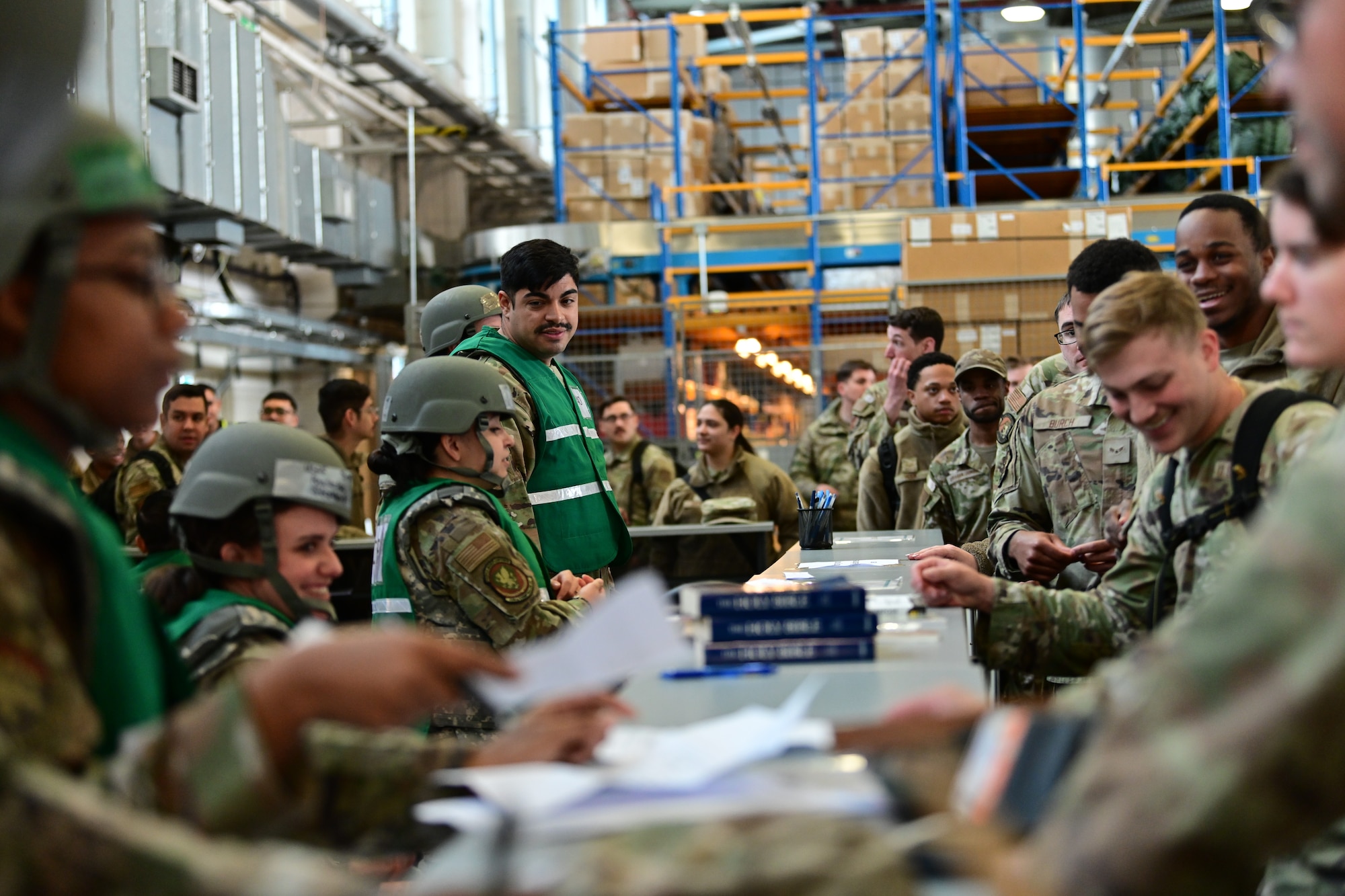 U.S. Airmen assigned to the 100th Air Refueling Wing participate in a simulated deployment line during combat readiness inspection Skyway Chariot at RAF Mildenhall, England, May 8, 2025.