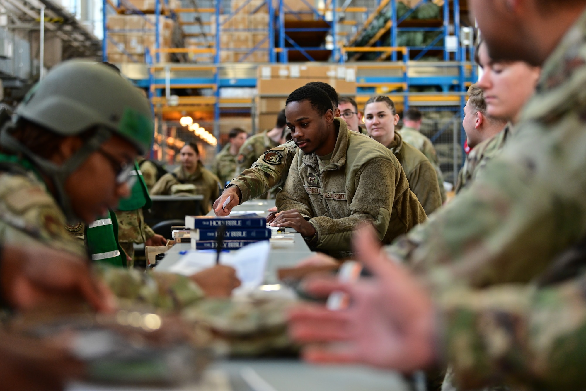 U.S. Airmen assigned to the 100th Air Refueling Wing participate in a simulated deployment line during combat readiness inspection Skyway Chariot at RAF Mildenhall, England, May 8, 2025.