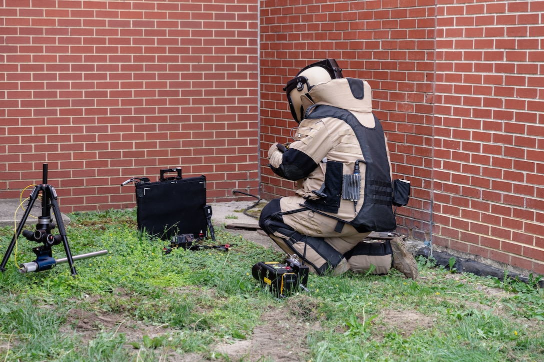 An Airman disposes of an unexploded ordnance during a Combat Readiness Inspection.