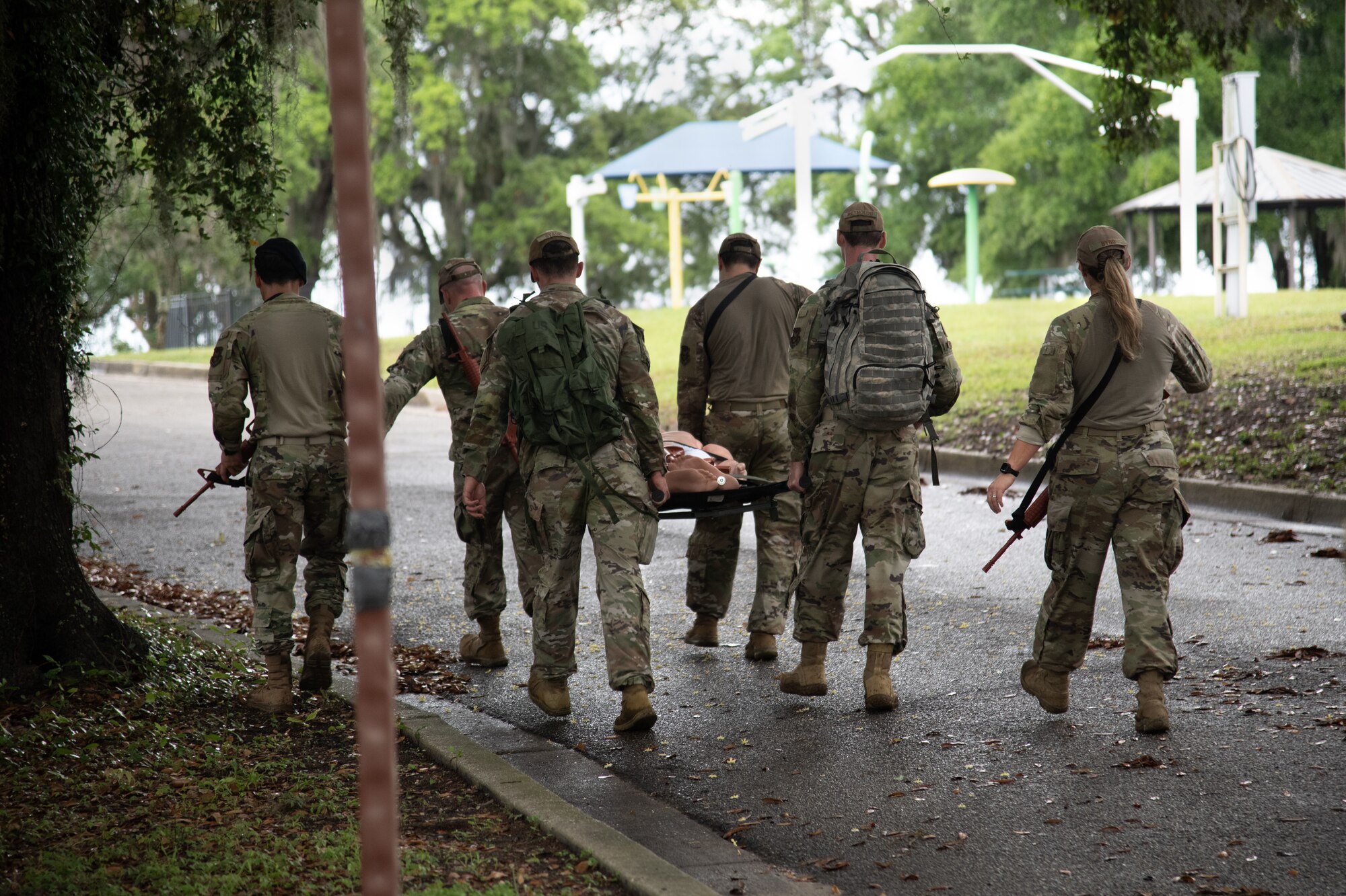 Airmen carrying litter
