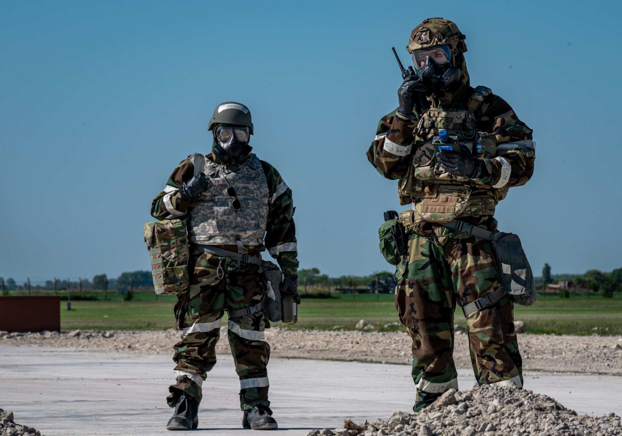 U.S. Airmen assigned to the 100th Civil Engineer Squadron scan the area for any simulated hazardous materials during combat readiness inspection Skyway Chariot at RAF Feltwell, England, May 10, 2025.