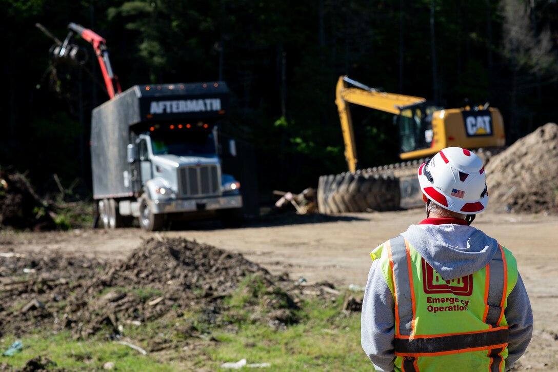 Quality Assurance Inspector Lious Munoz overlooking debris removal efforts at Lake James, NC