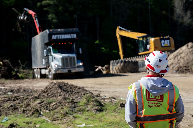 Quality Assurance Inspector Lious Munoz overlooking debris removal efforts at Lake James, NC