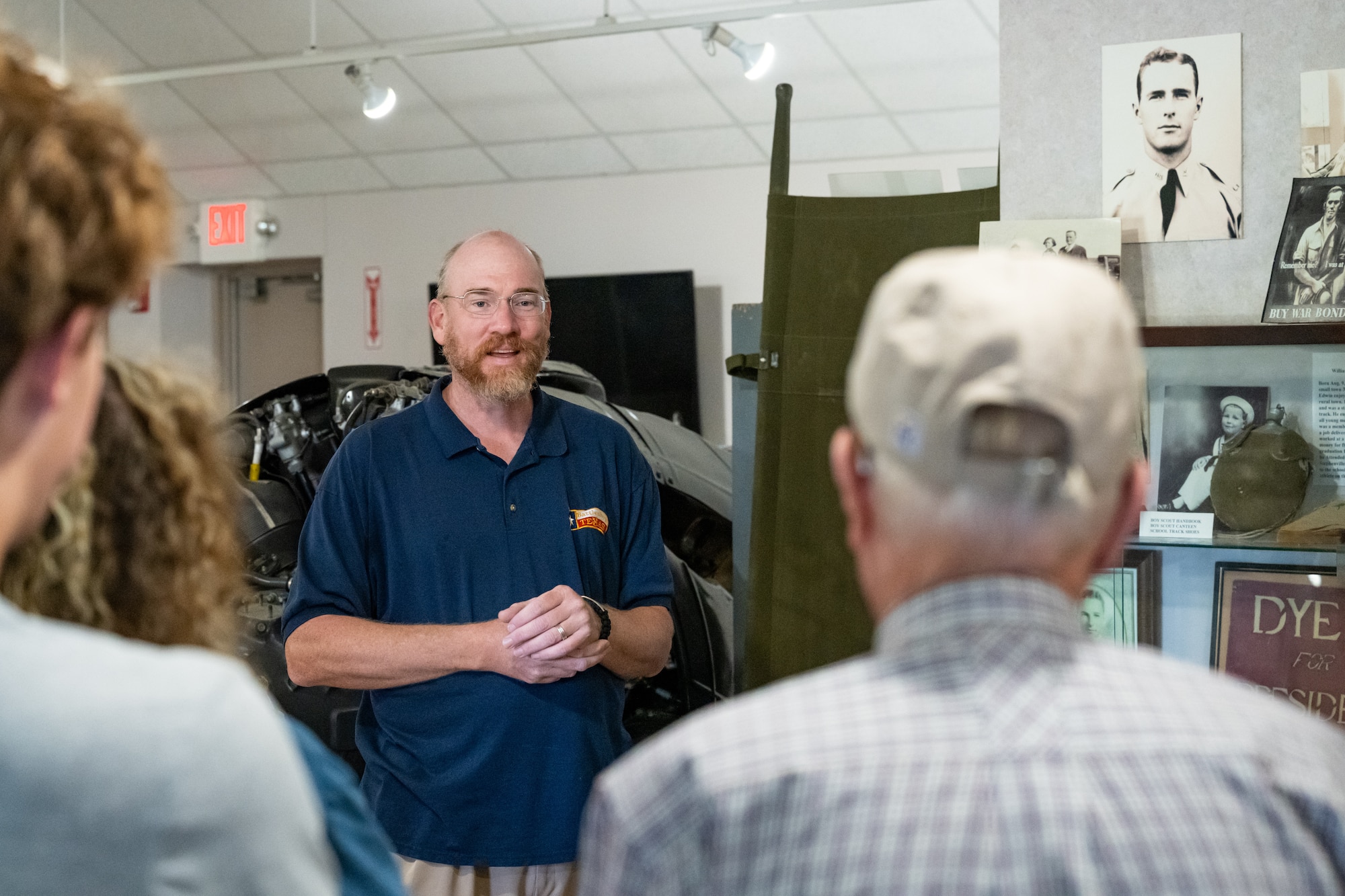 Walter Nicolds, Dyess Memorial Museum and Dyess Linear Air Park curator, guides relatives of Lt. Col. William E. Dyess during a tour at Dyess Air Force Base, Texas, May 9, 2025. Dyess, a U.S. Army Air Forces pilot during World War II, survived the Bataan Death March and died December 22, 1943. (U.S. Air Force photo by Airman 1st Class Jade M. Caldwell)