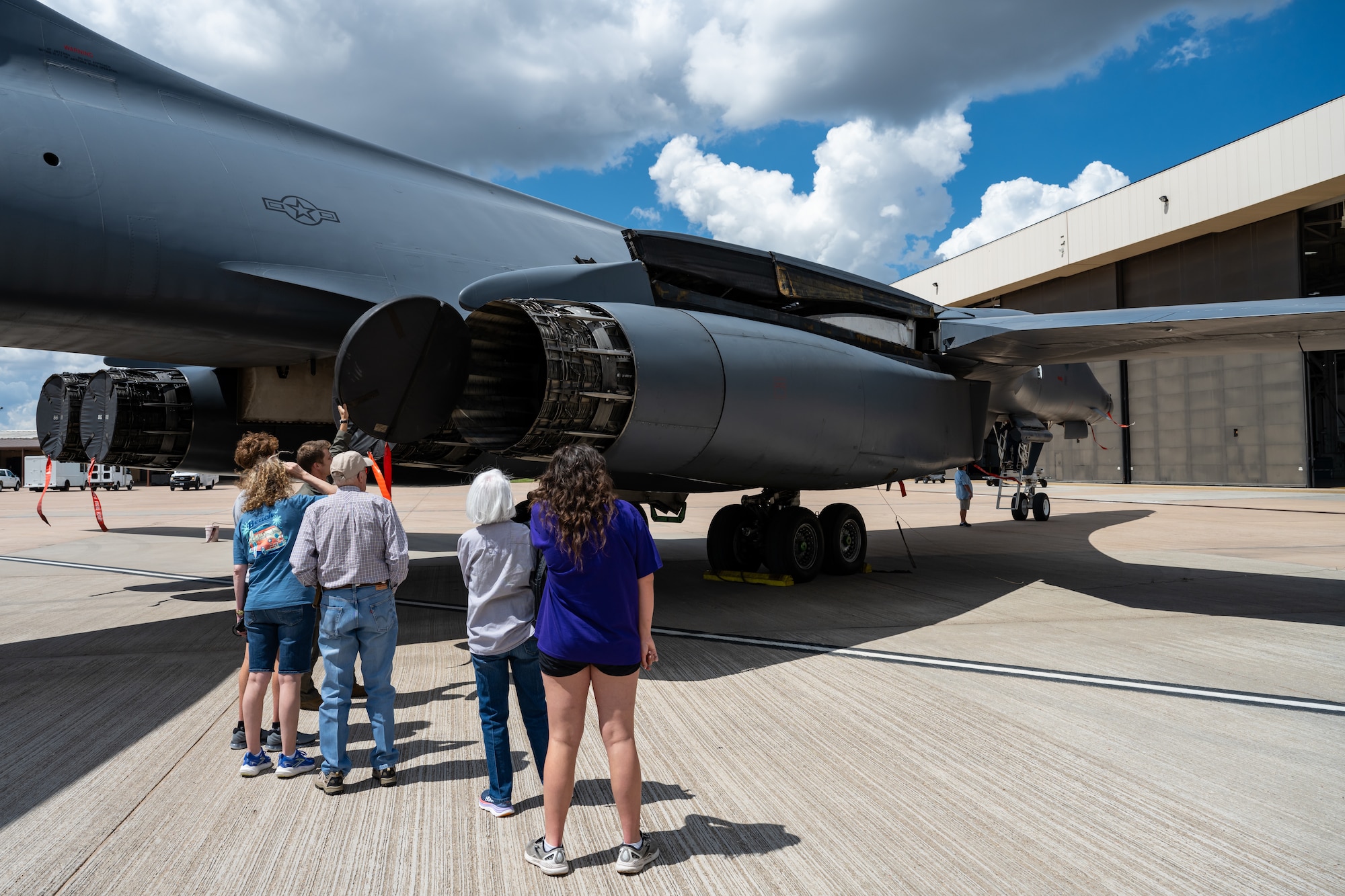 Relatives of Lt. Col. William E. Dyess observe a B-1B Lancer during a tour at Dyess Air Force Base, Texas, May 9, 2025.   Dyess AFB was renamed from Abilene AFB in 1956 in honor of the late Dyess, a two-time Distinguished Service Cross recipient with a remarkable career as an U.S. Army Air Force commander, infantry commander, and survivor of the Bataan Death March. (U.S. Air Force photo by Airman 1st Class Jade M. Caldwell)