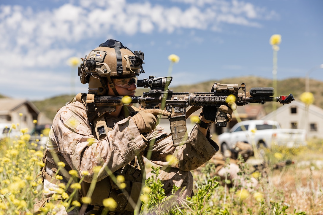 U.S. Marine Corps Cpl. Austin Haddaller, a machine gun section leader with Lima Company, 3rd Battalion, 1st Marine Regiment, 1st Marine Division, provides security during a raid leaders course hosted by Expeditionary Operations Training Group, I Marine Expeditionary Force, at Marine Corps Base Camp Pendleton, California, May 1, 2025.