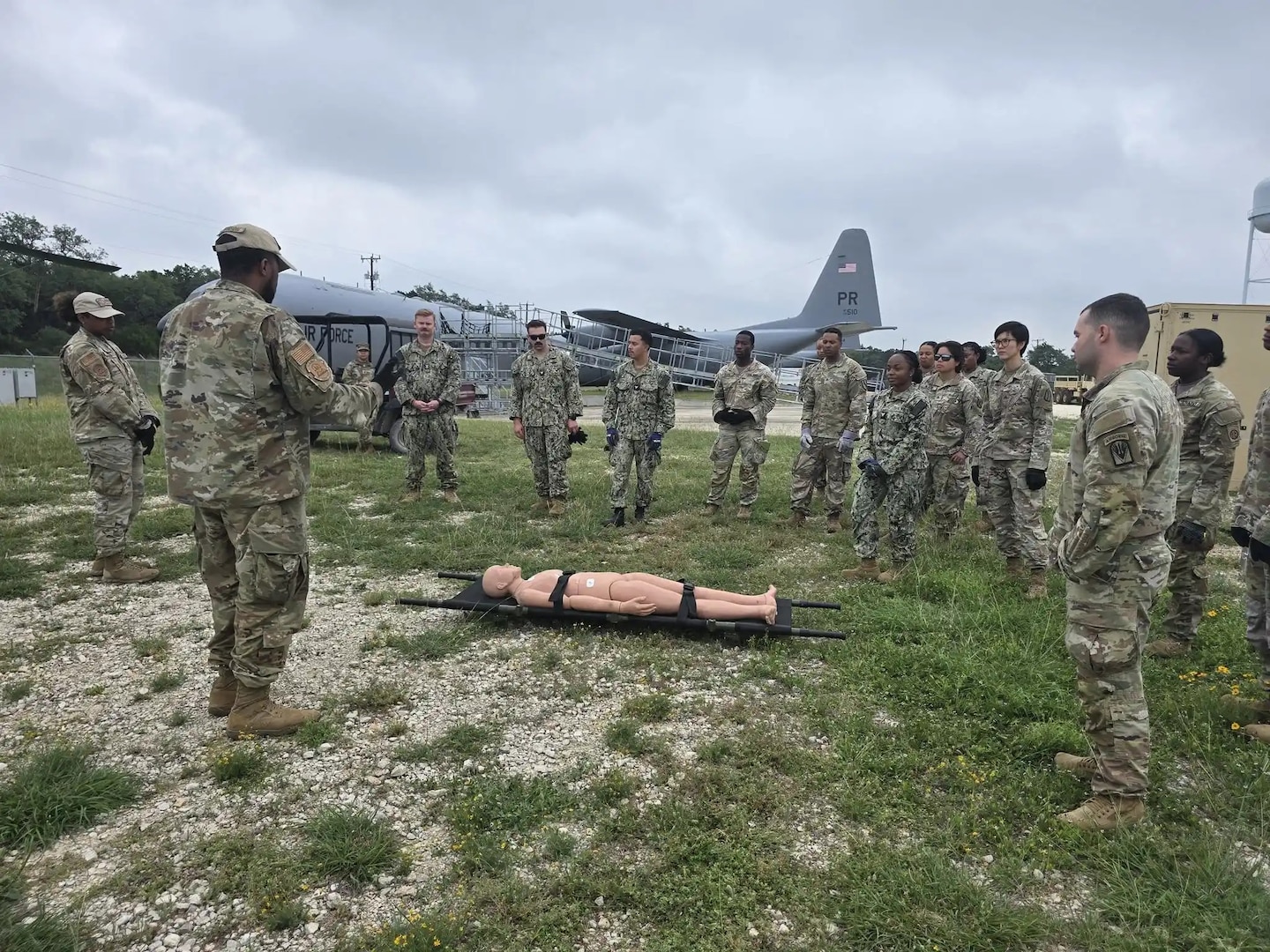 Army and Navy students in the Medical Education and Training Campus Respiratory Therapist course conduct a Joint Field Training Exercise on Joint Base San Antonio-Camp Bullis, Texas. A crucial component of the exercise involves Medical Evacuation and Aeromedical Evacuation procedures. Students learn the proper techniques for packaging and loading patients for transport.